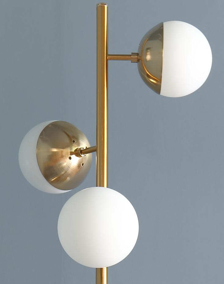 Oxenfurt | Brass with Frosted Spheres Floor Lamp - Home Cartel ®