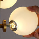 Synnove | Glass Sphere with Marble Base Floor Lamp