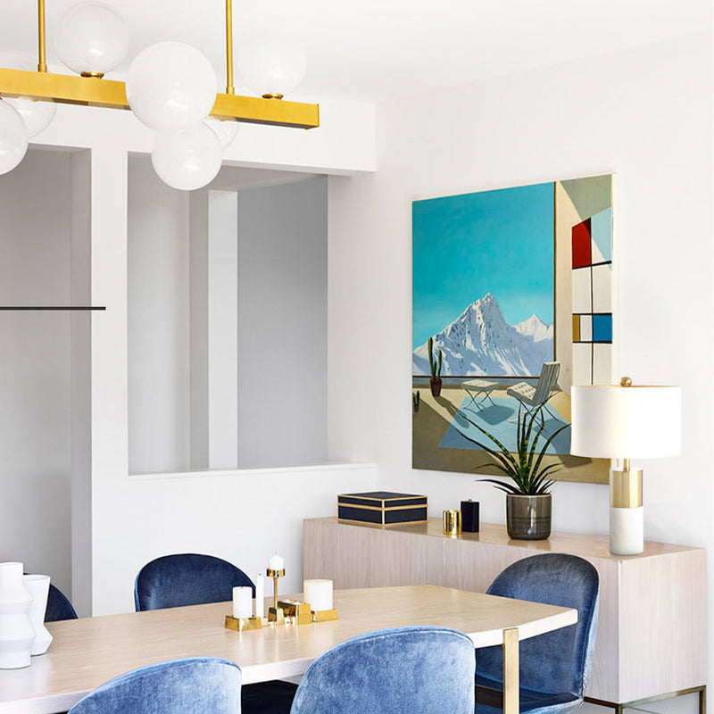 A cozy-looking home interior complete with several white lighting fixtures.