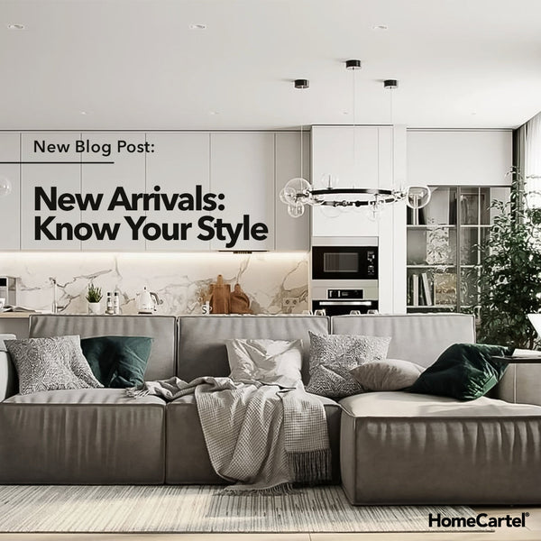 A modern gray living room with a chandelier in the background