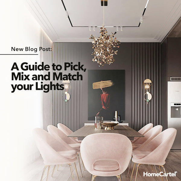 A dining area with pink chairs and artistic chandelier