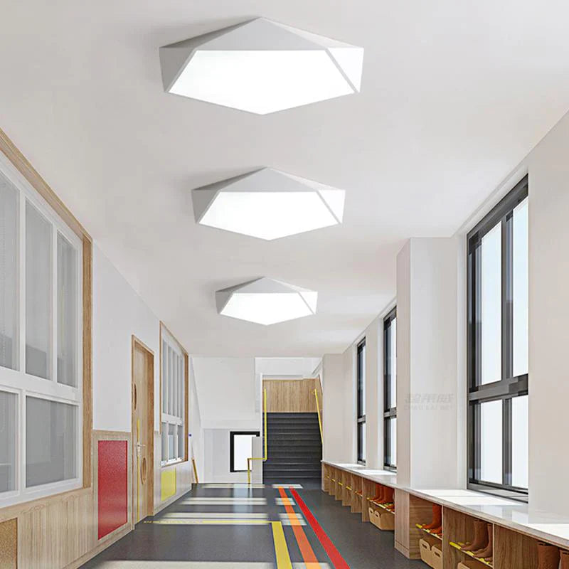 White polygon ceiling light in the hallway