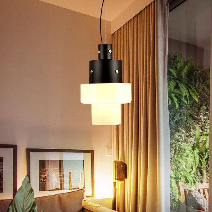 A black and white modern ceiling light inside a cozy room