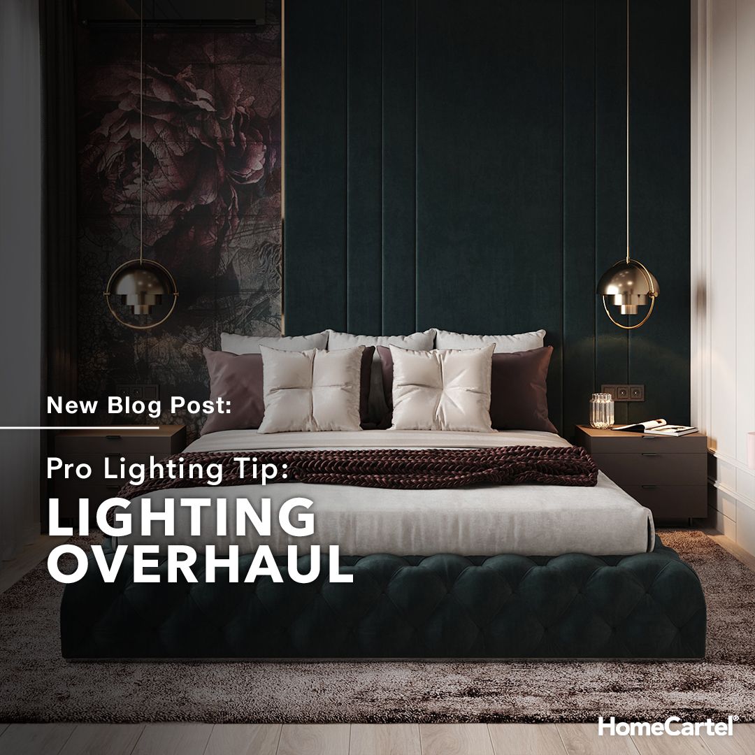 A modern bedroom with pendant lights hanging above both bedside tables