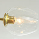 Vanja 7 A | Gold w/ Clear Glass Luxe Chandelier - Home Cartel ®