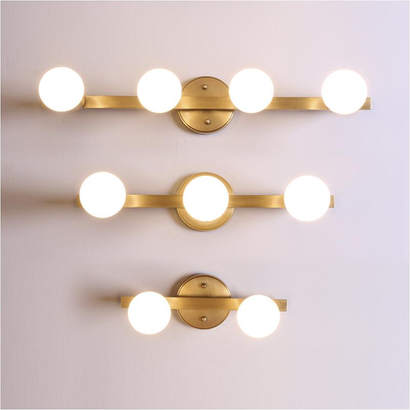 Freydis | Gold Modern Wall Sconce - Home Cartel ®
